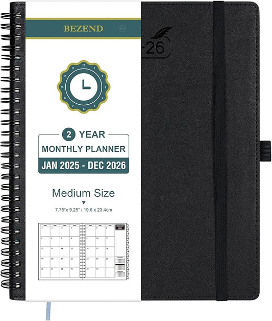 BEZEND 2 Year Monthly Planner 2025-2026 Medium Size 7" x 9" (Jan 2025 - Dec 2026) Spiral Calendar Book with Tabs, 120 GSM Thick Paper, Storage Pockets & Notes, PU Leather Softcover in Black